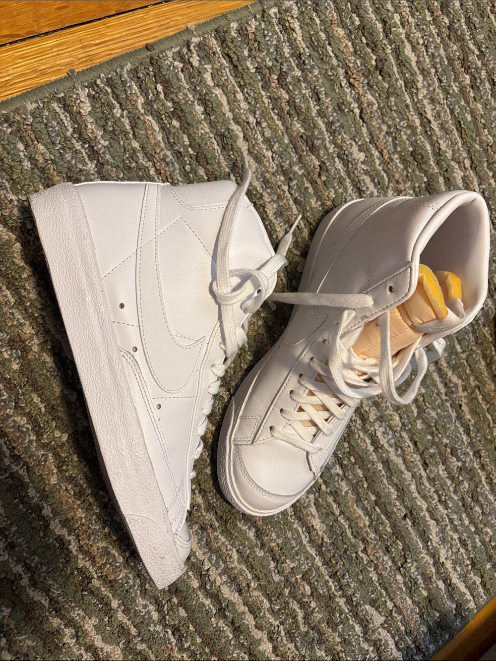 All White High-Top Nike Blazer Sneakers